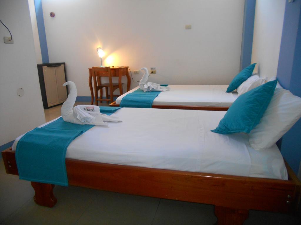 El Descanso Del Petrel ปูแอร์โตอาโยรา ภายนอก รูปภาพ